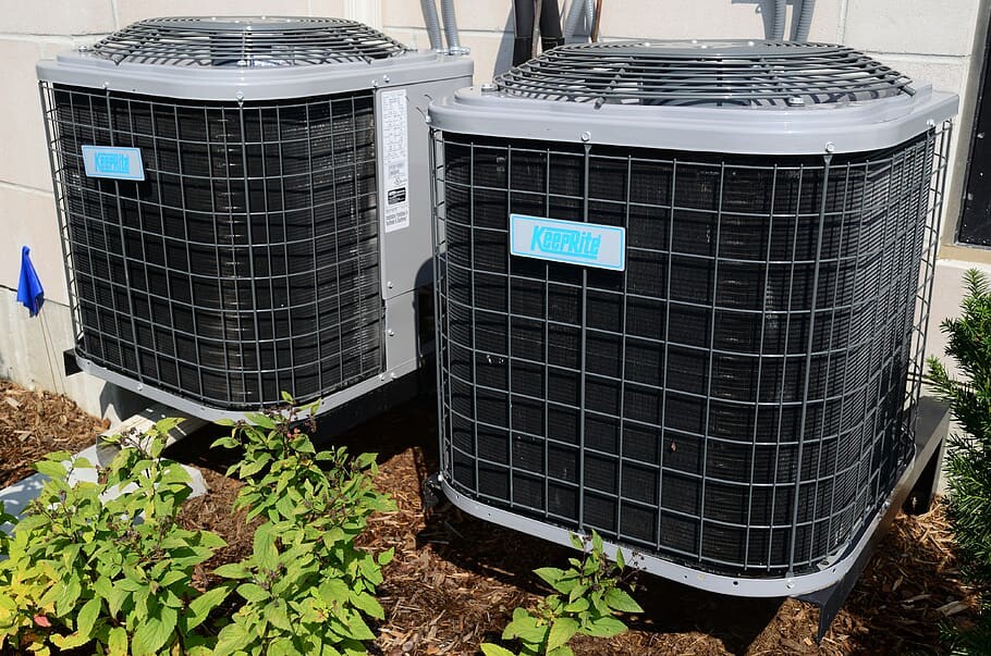 Image of air conditioner fan unit outside.