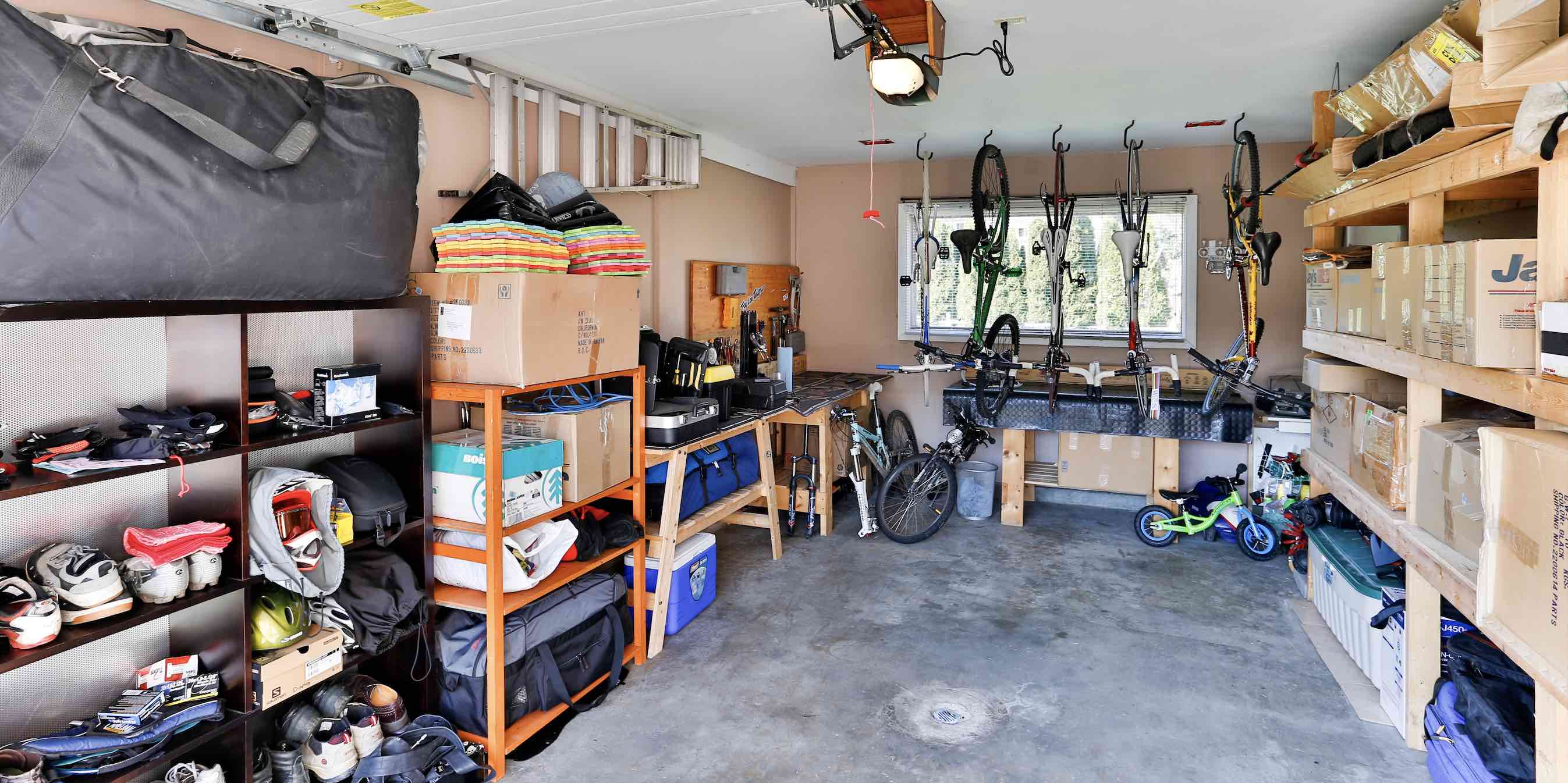 Picture of interior of a home's garage house to represent the sub-title is your garage cluttered?